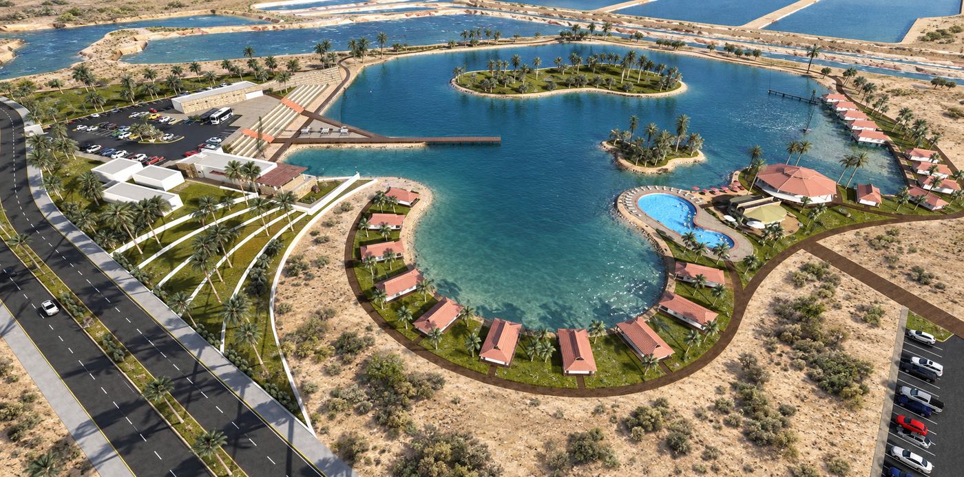 Aerial view of a coastal resort lagoon and master plan