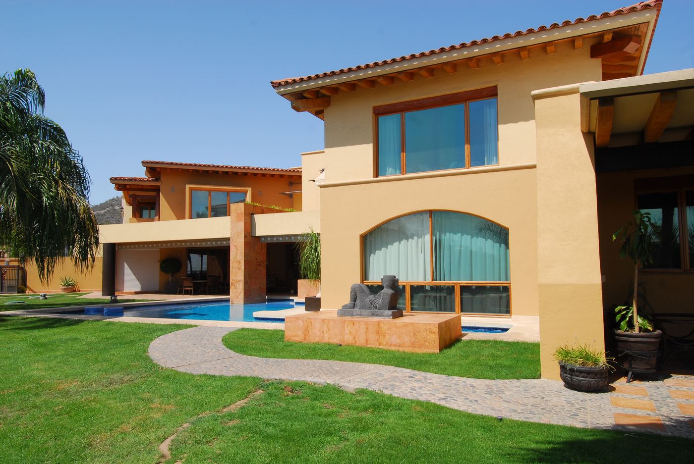Residence with pool and terraces under a clear sky
