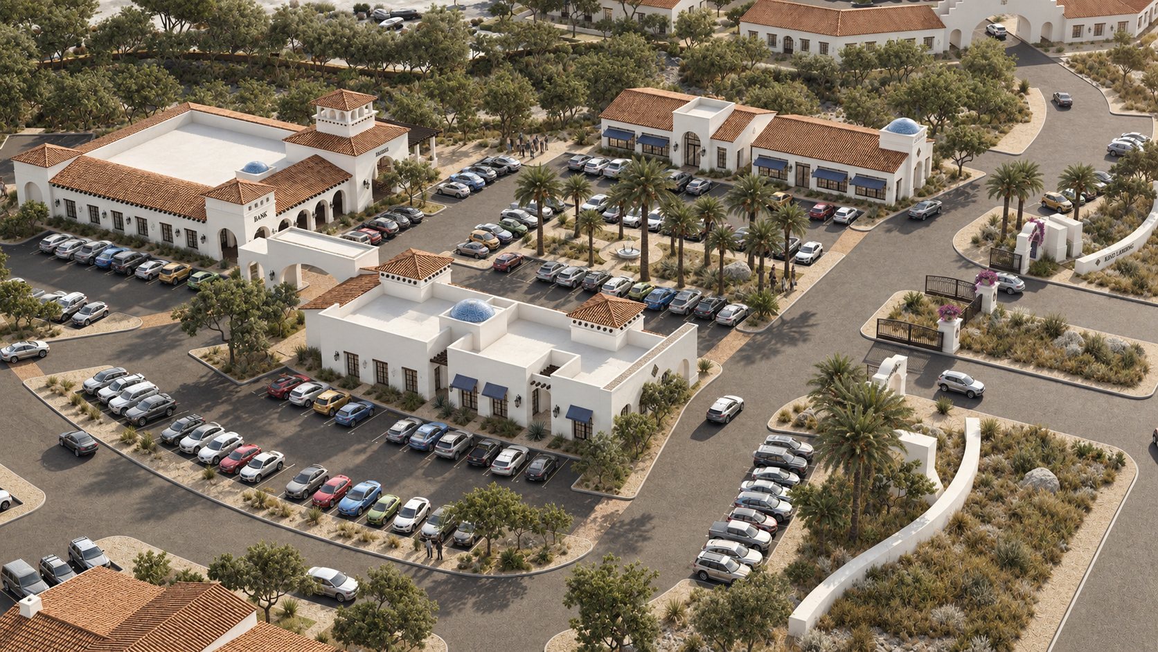 The Village at Kino Landing, mission-style buildings with tile roofs against the desert mountains